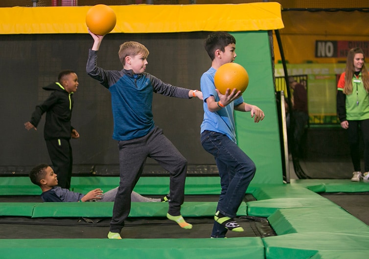 Boys in Rockin Jump Dodgeball Arena